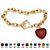 Crystal Heart Charm Simulated Birthstone Toggle Bracelet in Yellow Gold Tone-107 at PalmBeach Jewelry