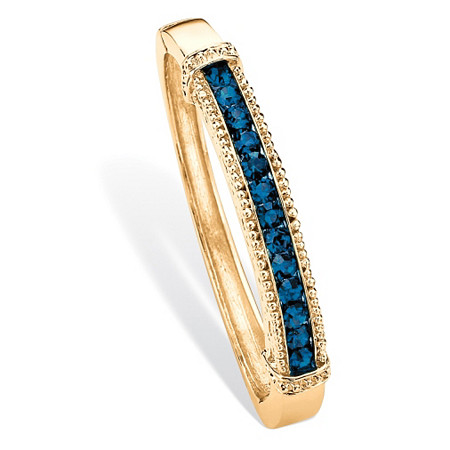 Round Pave Simulated Blue Sapphire Bangle Bracelet 4.08 TCW in Gold Tone 8" at PalmBeach Jewelry