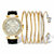 Round Crystal 7-Piece Fashion Watch with Black Leather Strap and Bangle Bracelet Set in Goldtone 7"-11 at PalmBeach Jewelry